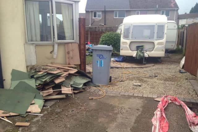 Ripped-up carpeting brought up from the ground floor.