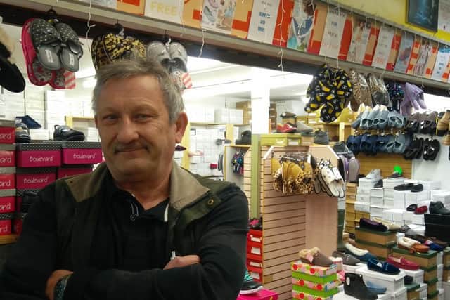 Shoe shop stallholder Andrew Orme says traders have been left in the dark over provisions to ease their transition.