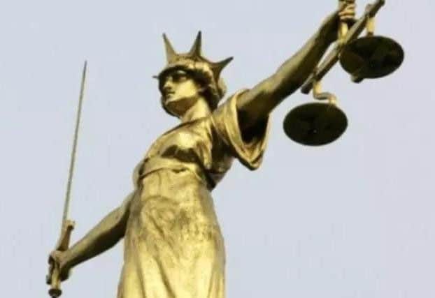She will face trial next year.