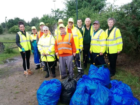 Volunteers from Oak Tree conservation Group , Mansfield District Council, Tesco and Veolia with sacks of rubbish collected in the big Clean Up.