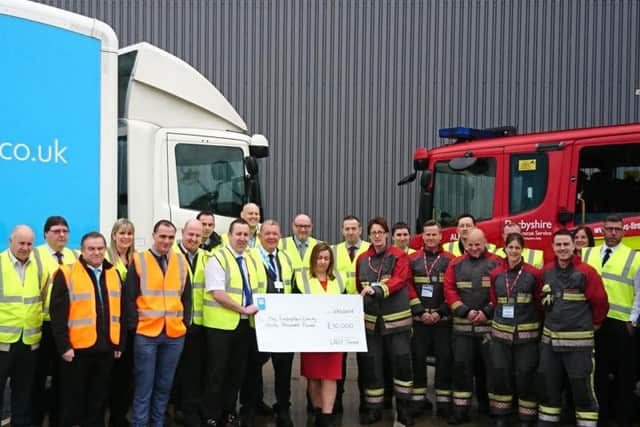 The food store at Victoria Street, Shirebrook, has helped raise 30,000 to support The Fire Fighters Charity