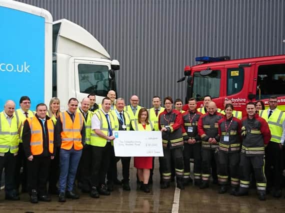 The food store at Victoria Street, Shirebrook, has helped raise 30,000 to support The Fire Fighters Charity