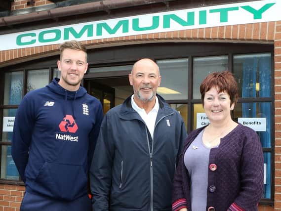Notts and England cricketer Jake Ball and international umpire Tim Robinson dropped in to help Helen Hollis open the new Community Help Centre on Market View