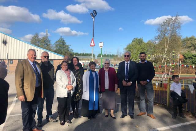 Members of Nottinghamshire County Council and Bildworth Parish Council, along with Marilyn Brown (fourth from left) and Kiran Chouhan, area executive for Proludic, who built the park.