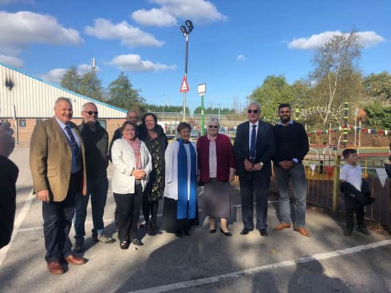 Members of Nottinghamshire County Council and Bildworth Parish Council, along with Marilyn Brown (fourth from left) and Kiran Chouhan, area executive for Proludic, who built the park.