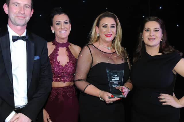The Lash and Brow Bar awarded the People Development Award by David Mackey from the University of Derby.