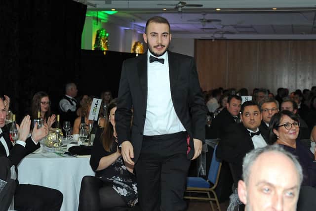 Apprentice of the Year, Matt Iddon, makes his way to the stage.