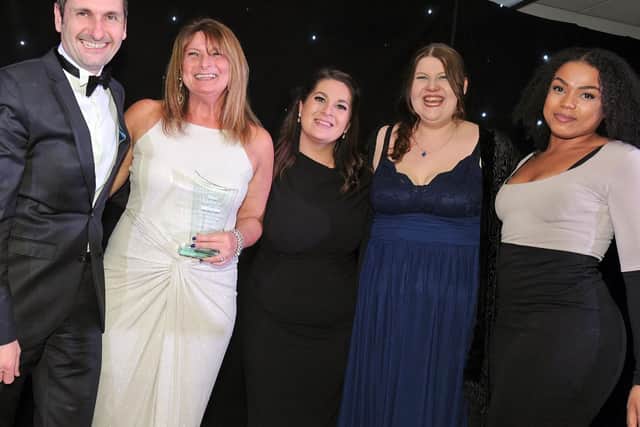 Business Person of the Year Marie Tracey of Heart Security is presented her award by Chad Group Editor Phil Bramley.