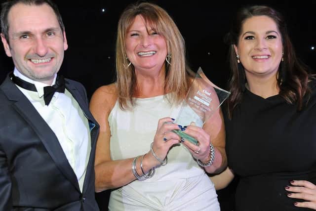 Business Person of the Year Marie Tracey of Heart Security is presented her award by Chad Group Editor, Phil Bramley.