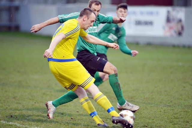 Match action from Selston's 2-1 win at Belper United.
