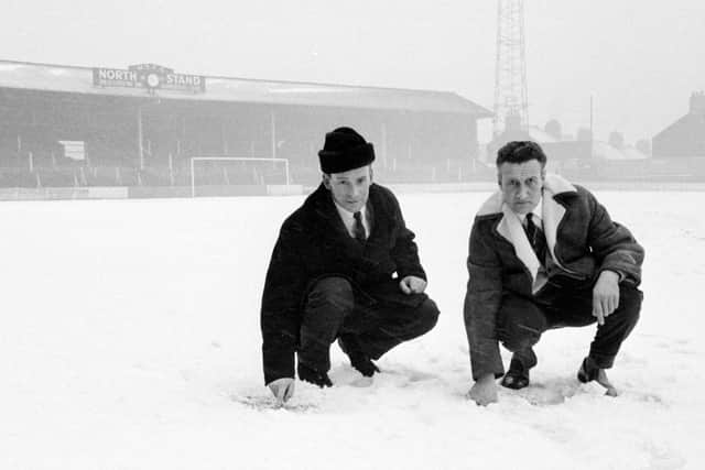 Checking the depth of snow at the stags ground.