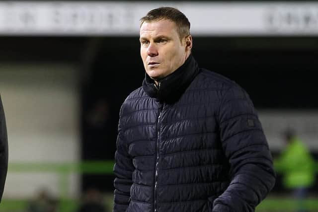 Stags boss David Flitcroft before the game at the New Lawn.
