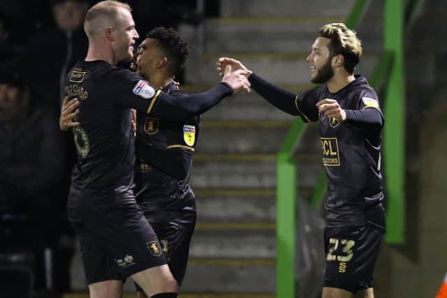 Mansfield celebrate their goal.