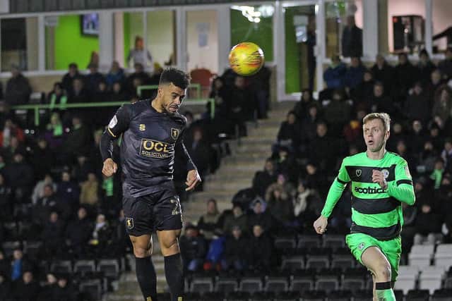 Nicky Ajose heads against the Forest Green crossbar