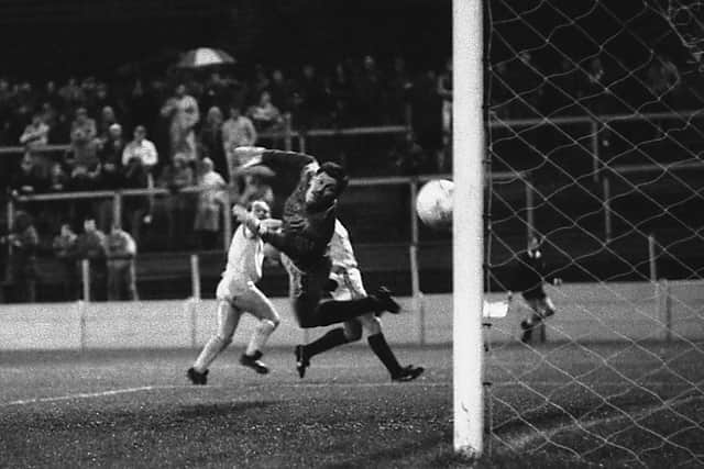 Neil Whatmore (far left) sees his shot arrow into the net.
