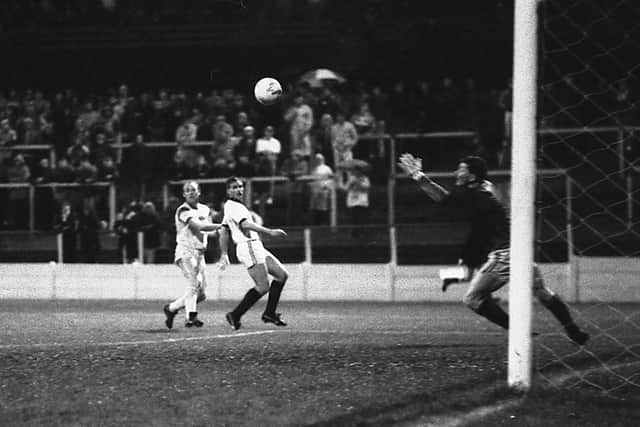 Neil Whatmore (far left) sees his shot arrow into the net.