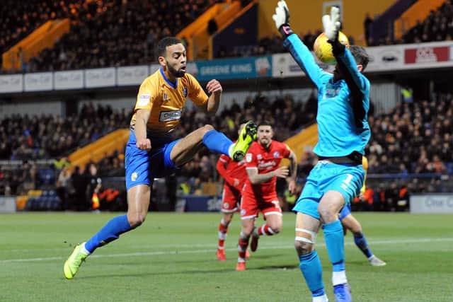 CJ Hamilton attempts to chip the keeper.