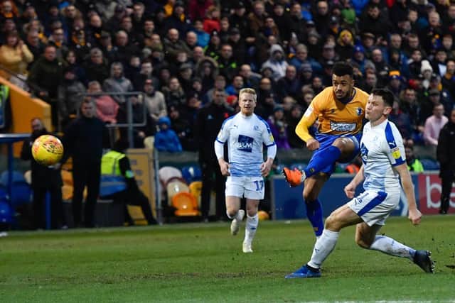 Nicky Ajose takes a shot at goal.