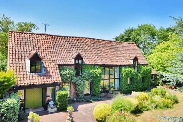 This barn conversion features five bedrooms and three bathrooms, as well as an indoor heated swimming pool. All the details are here: https://www.rightmove.co.uk/property-for-sale/property-74402357.html