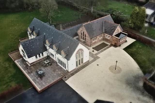 This five bedroom detached property is a former school and features a mezzanine cinema room with par three golf hole. Full details here: https://www.rightmove.co.uk/property-for-sale/property-78835604.html