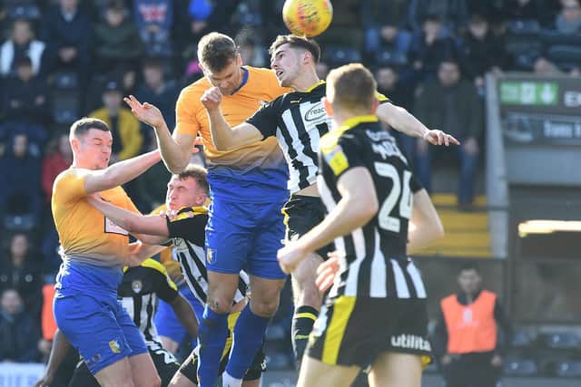 Notts County v Mansfield Town, Stag's Ben Turner heads at County's goal.