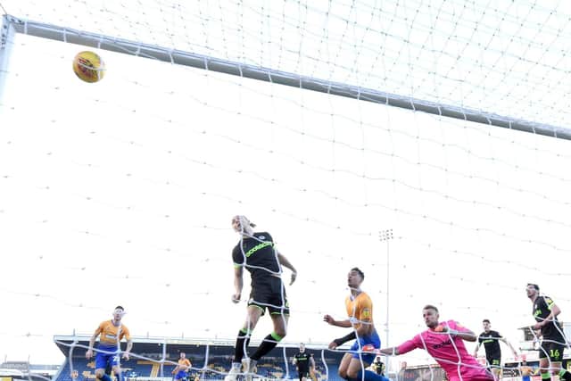 Mansfield Town v Forest Green Rovers, Forest Green's Joseph Mills scores an own goal to give Mansfield the lead.