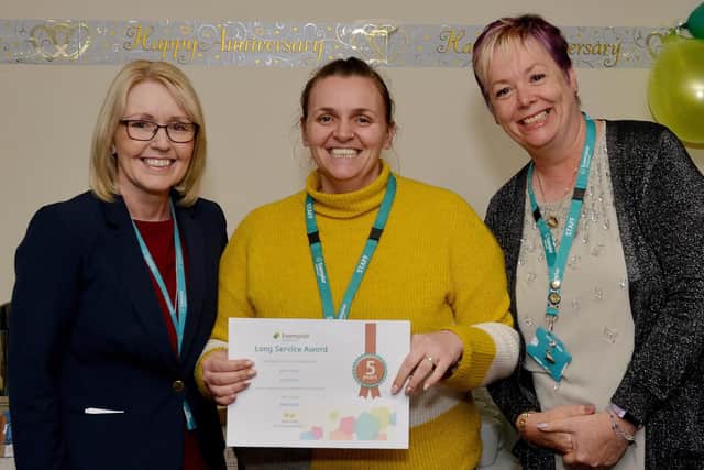 Alison Walvin receiving her long service award from Clinical Director Helen Baxendale and Head of Health and Safety Melanie Phillips