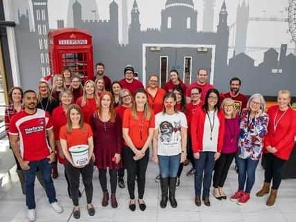 Pictured are members from Slimming World in Alfreton, who are promoting the 'wear red' campaign for Red Nose Day.