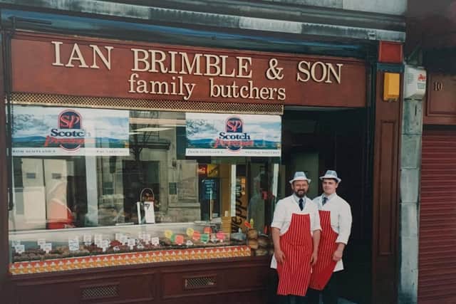 Ian and David Brimble pictured outside the shop in about 92.