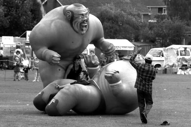1989: These two seem to be enjoying the giant inflatable boxing game at the Mansfield Show. Have you ever tried your hand at this or something similar?