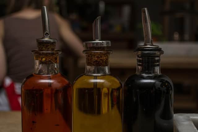 The acetic acid in vinegar will stop weed growth without damaging the soil and also deter small pests like ants.