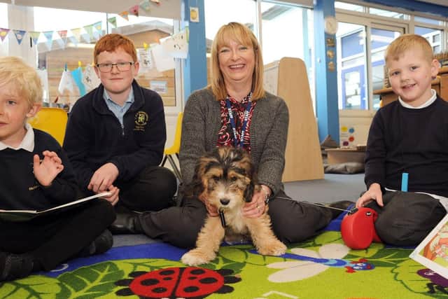 Head teacher, Helen Thomas with year six pupil Euan and Elliott and Leo.