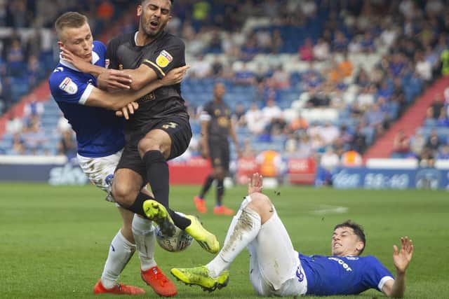 Match action from Mansfield's 3-2 defeat at Oldham.