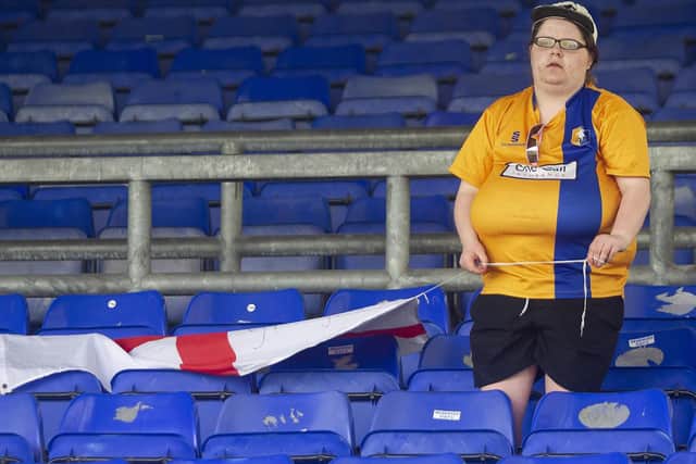 Mansfield Town fans during the defeat at Oldham
