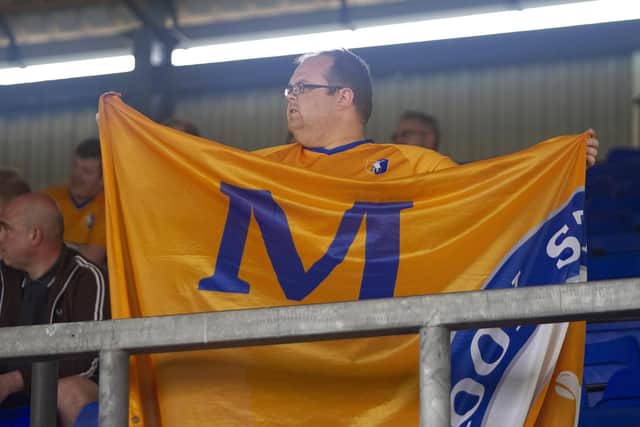Mansfield Town fans during the defeat at Oldham.