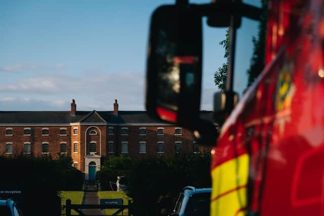 Crews arrive at Southwell Workhouse.