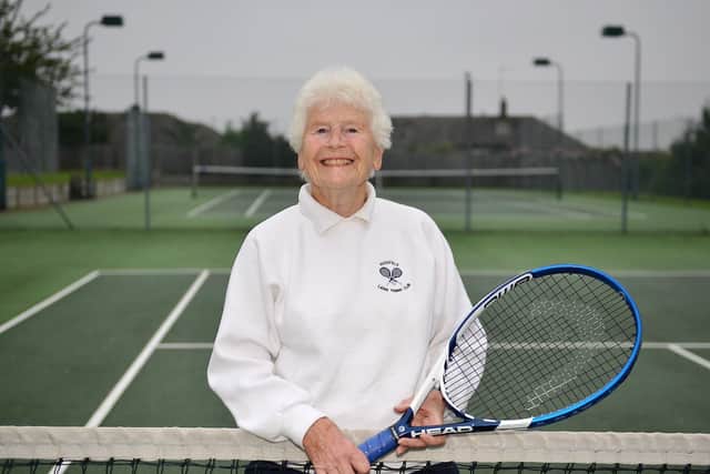 Mansfield Lawn Tennis Club president, Sally Beeley, on court.