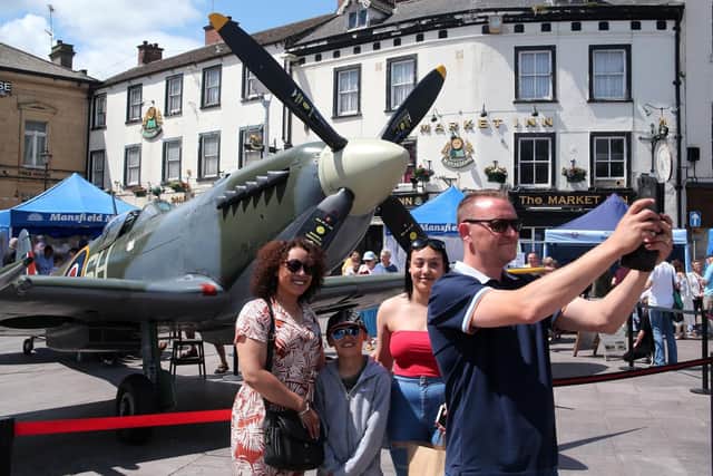 Selfie time for the Bonser family as dad Chris takes the photo of Emmey, Harvey and Sasha, with the MK 9 spitfire.