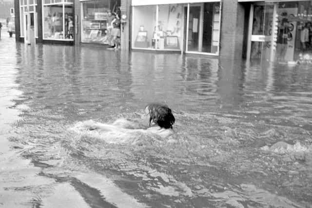 This picture gives you an idea of how deep the water got as this child decides to go for a swim.