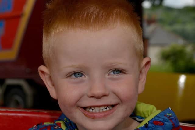 Dennis Hursthouse, two on the fairground rides