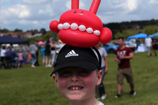 Balloon art was Thomas McPhees choise of headwear.