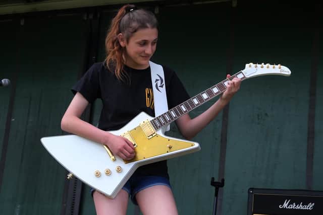Ebby Metal guitarist Ebony Bush wows the crowds.
