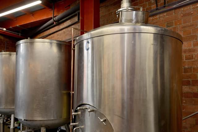 The on-site brewery behind the bar
