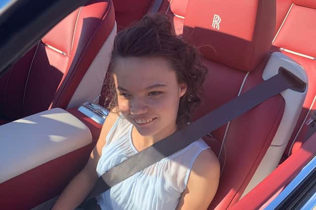 Jasmine Currie arriving in a Rolls Royce.