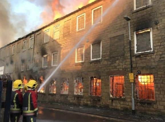 Firefighters tackle the blaze.