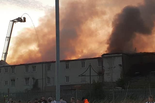 The fire saw smoke billowing from the building for hours. Photo: Steve Thornfield.