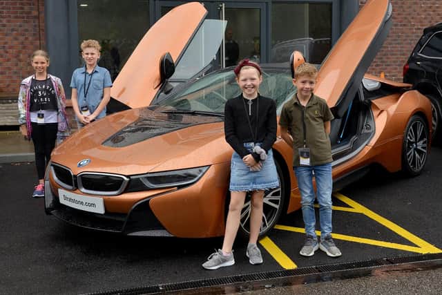 Chloe Johnson, Jayden Meldrum, Maisie Dobson and Alfie Hall take a look at a BMW Roadster