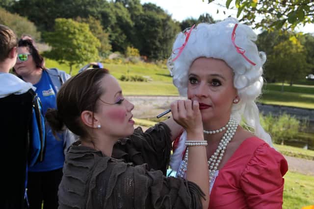 Helen Mumby puts the beauty spots onto Carolyn Frith.