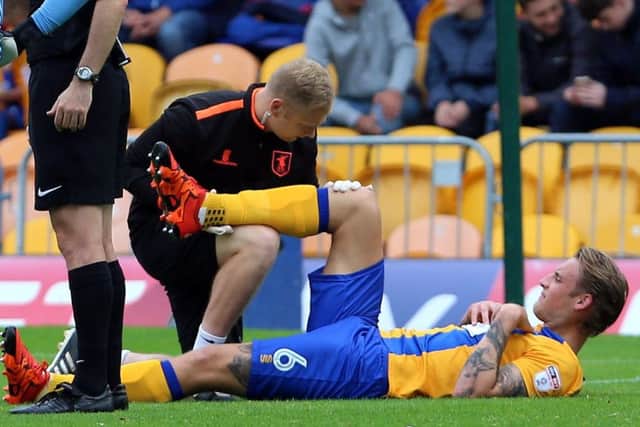 Mansfield Town v BarnetEnglish League Football - Sky BET League TwoField Mill, Mansfield, England10th September 2016Mansfield Town's George Taft gets treatment before leaving the pitch injuredPicture by Dan Westwelldan.westwell@btinternet.com07793 733140