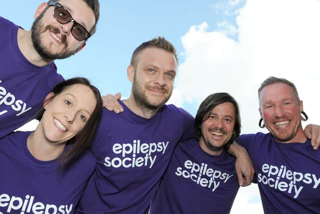 Wayne Pettinger, Danielle and Mark Kemp, Jamie Snarski and Jason Berrow get acquainted with the clouds ahead of their parachute jump for the Epilepsy Society. Picture by Anne Shelley.